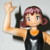 A figure of Miyu in a black swimsuit with tanned skin.